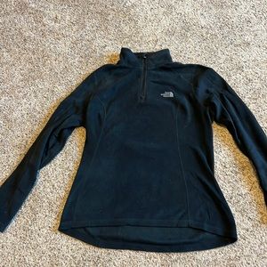 The North Face black size medium Women’s velour quarter zip top.